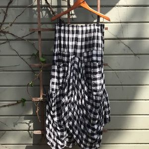 Dress To Kill checkered black and whites skirt.